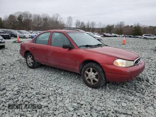 2000 Ford Contour z VIN 3FAFP6635YM116450, wystawiony jako Copart lot #44007405 z przebiegiem 361 094 mil mil oraz Szkoda całkowita • Salvage title. Historia ofert i sprzedaży dostępna na DreamBid. Obrazek 4.