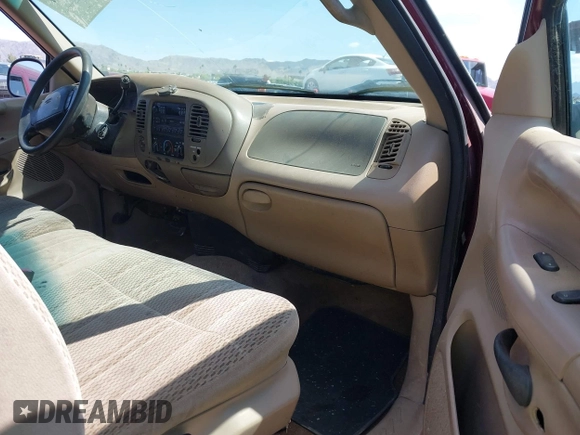 1997 Ford F-150 z VIN 2FTDX18WXVCA51615, wystawiony jako IAAI lot #42425367 z przebiegiem 160 402 mil mil oraz . Historia ofert i sprzedaży dostępna na DreamBid. Obrazek 5.