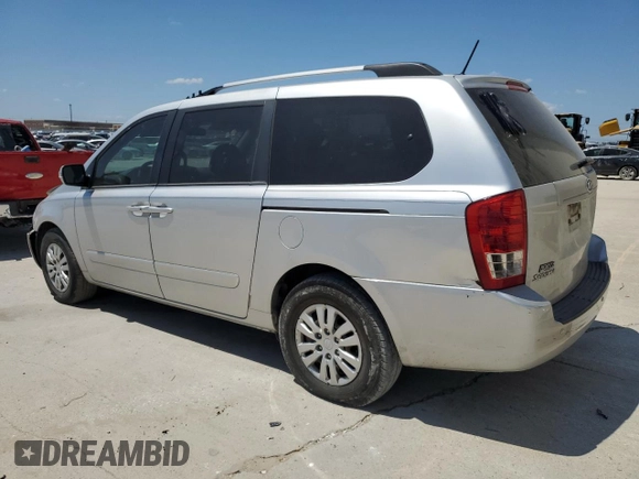 2012 Kia Sedona LX with VIN KNDMG4C74C6485709, listed as a Copart auction lot 67355154 with 196,052 mi miles and Salvage Title. Bid and sale history available at carsss.com. Image 2.