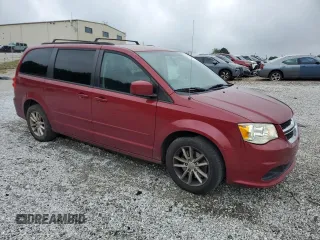 2014 Dodge Grand Caravan SXT with VIN 2C4RDGCG8ER120834, listed as a Copart auction lot 53630565 with 245,454 mi miles and Salvage Title. Bid and sale history available at DreamBid. Image 4.