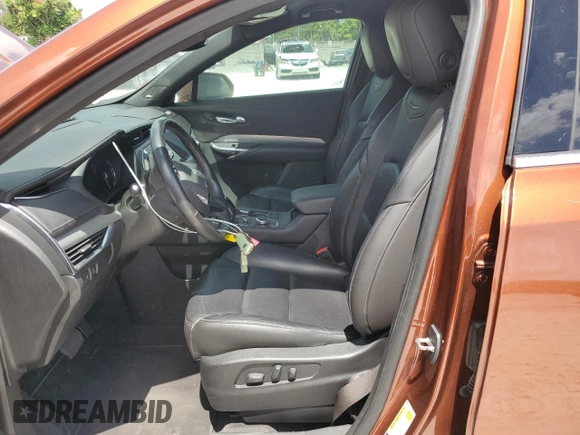 2019 Cadillac XT4 FWD Premium Luxury with VIN 1GYFZCR41KF183507, listed as a Copart auction lot 61581215 with 64,803 mi miles and Salvage title. Bid and sale history available at DreamBid. Image 7.