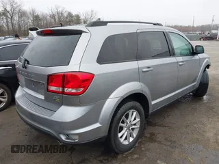 2016 Dodge Journey SXT with VIN 3C4PDCBG4GT122761, listed as a IAAI auction lot 41751265 with 130,304 mi miles. Bid and sale history available at carsss.com. Image 4.