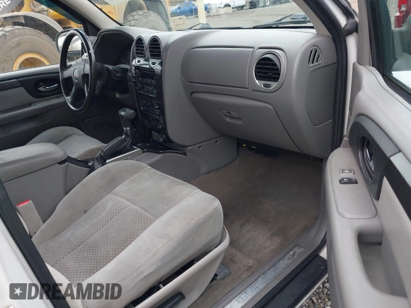 2009 GMC Envoy SLE with VIN 1GKDS33S892108589, listed as a IAAI auction lot 41883738 with 172,027 mi miles. Bid and sale history available at carsss.com. Image 5.
