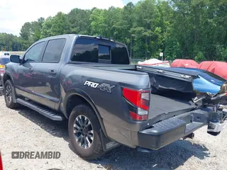2024 Nissan Titan Pro-4X with VIN 1N6AA1ED8RN114313, listed as a IAAI auction lot 42498591 with 21,955 mi miles and . Bid and sale history available at DreamBid. Image 3.