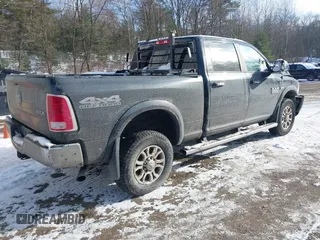 2018 Ram 2500 Laramie with VIN 3C6UR5FJXJG253495, listed as a IAAI auction lot 41084906 with 82,614 mi miles. Bid and sale history available at carsss.com. Image 4.