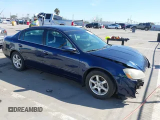2005 Nissan Altima S z VIN 1N4AL11D85N483983, wystawiony jako IAAI lot #41860511 z przebiegiem 177 499 mil mil oraz . Historia ofert i sprzedaży dostępna na DreamBid. Obrazek 1.