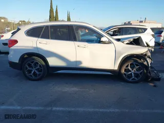 2019 BMW X1 sDrive28i with VIN WBXHU7C54K3H45462, listed as a IAAI auction lot 41209117 with 52,719 mi miles. Bid and sale history available at carsss.com. Image 13.