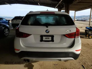 2015 BMW X1 sDrive28i with VIN WBAVM1C50FVW58031, listed as a Copart auction lot 48552735 with 205,392 mi miles and Salvage Title. Bid and sale history available at carsss.com. Image 6.