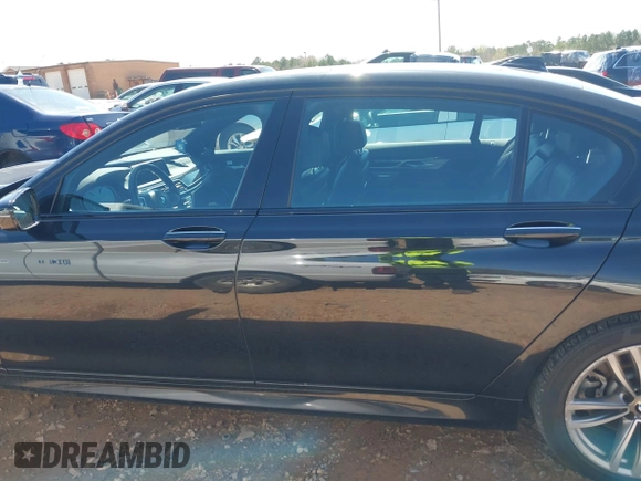2019 BMW 7 Series 740i xDrive with VIN WBA7E4C57KGV70521, listed as a IAAI auction lot 41881538 with 114,480 mi miles and . Bid and sale history available at DreamBid. Image 15.