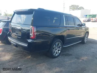 2015 GMC Yukon XL Denali with VIN 1GKS1JKJ5FR653076, listed as a IAAI auction lot 42072132 with 288,568 mi miles. Bid and sale history available at carsss.com. Image 4.