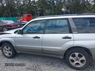 2003 Subaru Forester XS with VIN JF1SG65683H772567, listed as a IAAI auction lot 42239379 with 285,002 mi miles and . Bid and sale history available at DreamBid. Image 14.