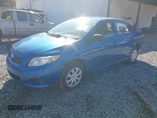 2010 Toyota Corolla with VIN 1NXBU4EE9AZ268236, listed as a IAAI auction lot 41427141 with 112,747 mi miles. Bid and sale history available at carsss.com. Image 2.