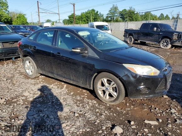 2013 Ford Focus SE z VIN 1FADP3F27DL369634, wystawiony jako Copart lot #61409725 z przebiegiem 122 709 mil mil oraz Szkoda całkowita • Salvage title. Historia ofert i sprzedaży dostępna na DreamBid. Obrazek 4.