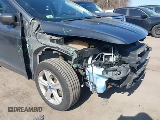 2013 Ford Escape SE with VIN 1FMCU9G94DUC98363, listed as a IAAI auction lot 41752773 with 150,547 mi miles and . Bid and sale history available at DreamBid. Image 6.