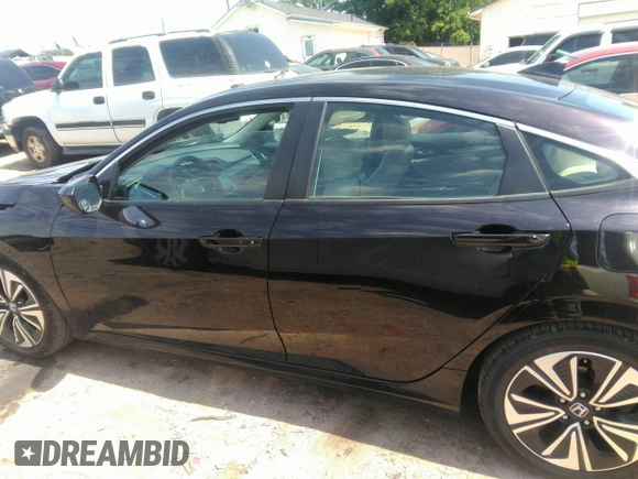 2016 Honda Civic EX-L z VIN 19XFC1F74GE041373, wystawiony jako IAAI lot #42201565 z przebiegiem 122 069 mil mil oraz . Historia ofert i sprzedaży dostępna na DreamBid. Obrazek 14.
