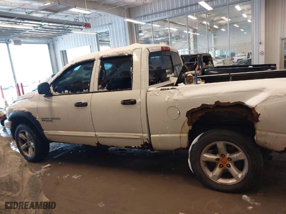 2006 Dodge Ram 1500 SLT with VIN 1D7HU18N76S662707, listed as a IAAI auction lot 41166938 with 260,186 mi miles. Bid and sale history available at carsss.com. Image 14.