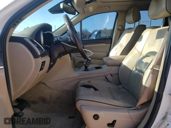 2015 Jeep Grand Cherokee High Altitude with VIN 1C4RJECG4FC654789, listed as a Copart auction lot 49378875 with 163,192 mi miles and Salvage Title. Bid and sale history available at carsss.com. Image 7.