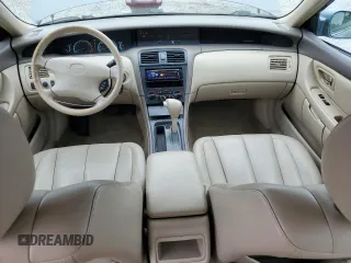 2000 Toyota Avalon XL with VIN 4T1BF28B2YU045935, listed as a Copart auction lot 57147225 with 164,261 mi miles and Salvage title. Bid and sale history available at DreamBid. Image 8.