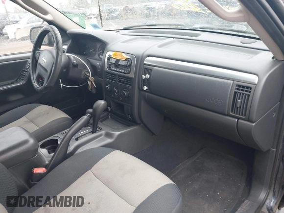 2004 Jeep Grand Cherokee Laredo with VIN 1J4GW48JX4C278260, listed as a IAAI auction lot 42046644 with 131,359 mi miles and . Bid and sale history available at DreamBid. Image 5.