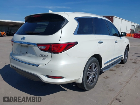 2017 Infiniti QX60 with VIN 5N1DL0MN8HC555993, listed as a IAAI auction lot 41588633 with 131,287 mi miles. Bid and sale history available at carsss.com. Image 4.
