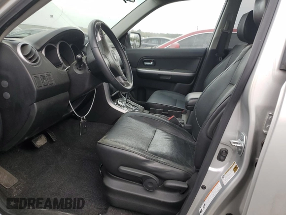 2010 Suzuki Grand Vitara Limited z VIN JS3TE0D73A4100112, wystawiony jako Copart lot #50907365 z przebiegiem 146 484 mil mil oraz Szkoda całkowita • Salvage title. Historia ofert i sprzedaży dostępna na DreamBid. Obrazek 7.