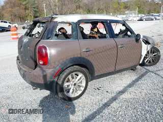 2013 MINI Cooper Countryman with VIN WMWZB3C59DWM31642, listed as a IAAI auction lot 40794983 with 1 mi miles. Bid and sale history available at carsss.com. Image 4.