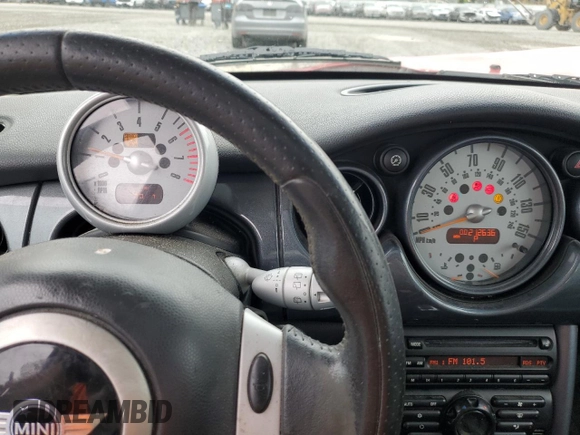 2004 MINI Hardtop with VIN WMWRC33464TJ54261, listed as a Copart auction lot 55150205 with 212,636 mi miles and Salvage Title. Bid and sale history available at DreamBid. Image 9.