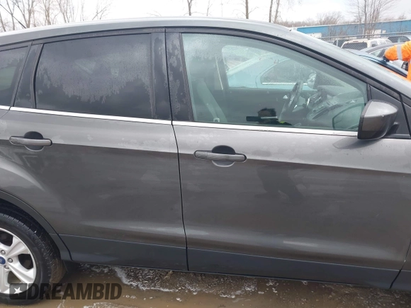2016 Ford Escape SE with VIN 1FMCU9GXXGUC53589, listed as a IAAI auction lot 42017364 with 89,394 mi miles. Bid and sale history available at carsss.com. Image 13.