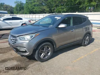 2017 Hyundai Santa Fe 2.4L z VIN 5NMZU3LB4HH027644, wystawiony jako Copart lot #52219515 z przebiegiem 127 449 mil mil oraz Czysty tytuł • Clean title. Historia ofert i sprzedaży dostępna na DreamBid. Obrazek 1.