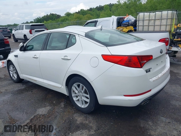 2013 Kia Optima LX z VIN KNAGM4A72D5366828, wystawiony jako IAAI lot #42106525 z przebiegiem 159 564 mil mil oraz . Historia ofert i sprzedaży dostępna na DreamBid. Obrazek 3.