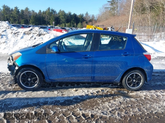 2012 Toyota Yaris L with VIN JTDKTUD31CD504632, listed as a IAAI auction lot 41660676 with 105,789 mi miles. Bid and sale history available at carsss.com. Image 13.