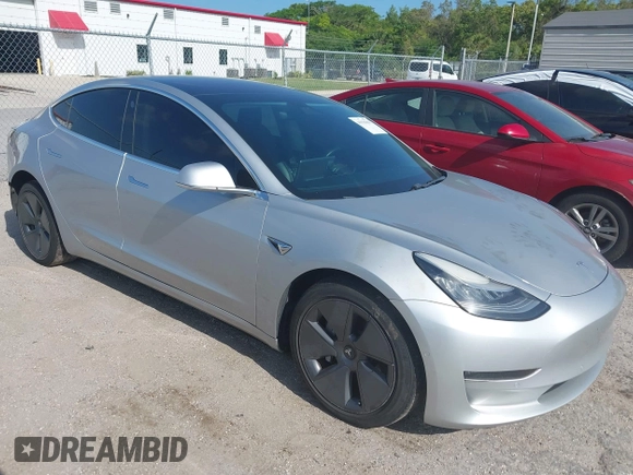 2018 Tesla Model 3 Long Range Battery with VIN 5YJ3E1EB7JF104356, listed as a IAAI auction lot 41936961 with 90,932 mi miles and . Bid and sale history available at DreamBid. Image 1.