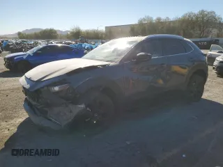 2023 Mazda CX-30 S Carbon Edition z VIN 3MVDMBCM3PM563405, wystawiony jako Copart lot #50573575 z przebiegiem 19 570 mil mil oraz Szkoda całkowita • Salvage title. Historia ofert i sprzedaży dostępna na DreamBid. Obrazek 1.