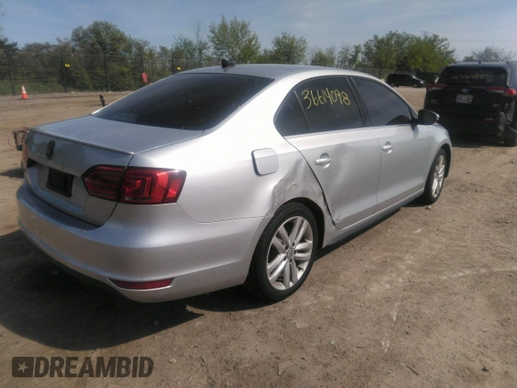 2014 Volkswagen Jetta GLI Autobahn z VIN 3VW5S7AJ4EM396791, wystawiony jako IAAI lot #39648541 z przebiegiem 103 025 mil mil oraz . Historia ofert i sprzedaży dostępna na DreamBid. Obrazek 4.