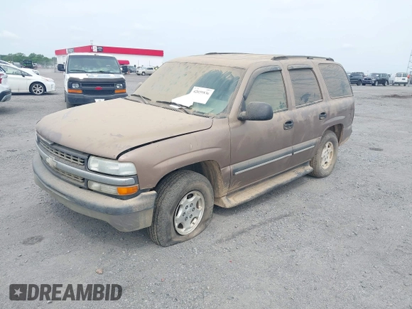 2004 Chevrolet Tahoe LT with VIN 1GNEC13Z04R126543, listed as a IAAI auction lot 42059836 with 252,773 mi miles. Bid and sale history available at carsss.com. Image 2.