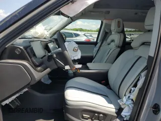 2024 Rivian R1S Adventure with VIN 7PDSGBBA1RN041672, listed as a Copart auction lot 61924974 with Not Provided miles and Salvage Title. Bid and sale history available at carsss.com. Image 7.