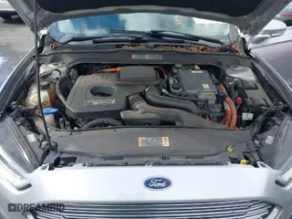 2015 Ford Fusion Energi SE Luxury with VIN 3FA6P0PU9FR234716, listed as a IAAI auction lot 41511289 with 143,158 mi miles. Bid and sale history available at carsss.com. Image 10.
