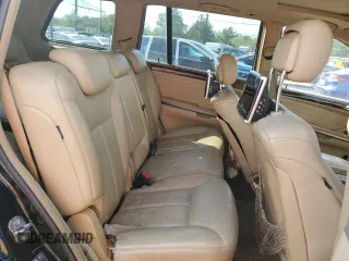 2009 Mercedes-Benz GL 550 z VIN 4JGBF86E49A501002, wystawiony jako Copart lot #56225565 z przebiegiem 168 098 mil mil oraz Szkody całkowita. Historia ofert i sprzedaży dostępna na DreamBid. Obrazek 11.