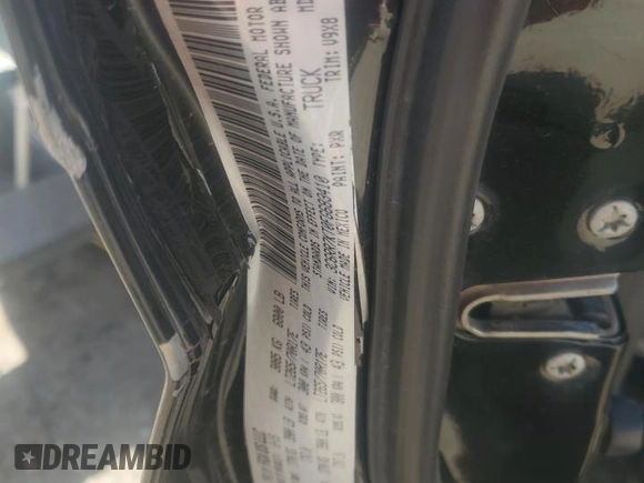 2015 Ram 1500 Tradesman with VIN 3C6RR7KT0FG683410, listed as a Copart auction lot 49448815 with 110,376 mi miles and Salvage title. Bid and sale history available at DreamBid. Image 14.