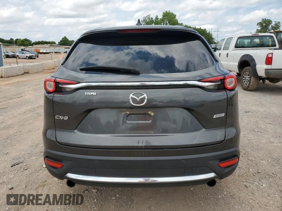 2016 Mazda CX-9 Grand Touring with VIN JM3TCADY3G0125814, listed as a Copart auction lot 58299595 with 127,035 mi miles and Salvage title. Bid and sale history available at DreamBid. Image 6.