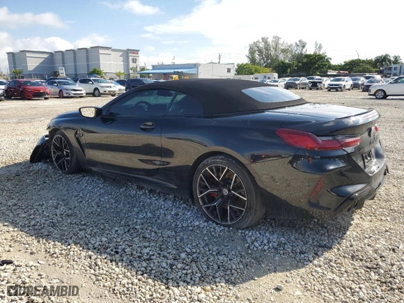 2023 BMW M8 Competition with VIN WBSDZ0C03PCL67186, listed as a Copart auction lot 71714954 with 22,875 mi miles and Salvage Title. Bid and sale history available at carsss.com. Image 2.
