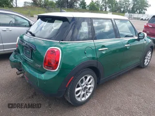 2020 MINI Hardtop 4 Door Cooper with VIN WMWXU7C03L2L46525, listed as a IAAI auction lot 42585895 with 42,864 mi miles and . Bid and sale history available at DreamBid. Image 4.