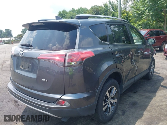 2018 Toyota RAV4 XLE with VIN JTMWFREV7JD111785, listed as a IAAI auction lot 42583535 with 110,724 mi miles and . Bid and sale history available at DreamBid. Image 4.