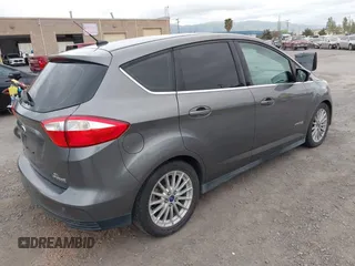 2013 Ford C-Max SEL z VIN 1FADP5BU2DL543029, wystawiony jako IAAI lot #42115325 z przebiegiem 131 855 mil mil oraz . Historia ofert i sprzedaży dostępna na DreamBid. Obrazek 4.