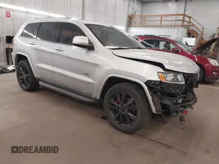 2011 Jeep Grand Cherokee Laredo with VIN 1J4RR4GGXBC684171, listed as a IAAI auction lot 41889727 with 141,202 mi miles and . Bid and sale history available at DreamBid. Image 1.