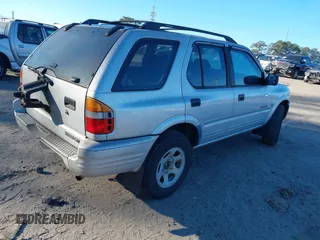 2000 Honda Passport LX with VIN 4S6CK58W4Y4415990, listed as a IAAI auction lot 41177782 with 242,583 mi miles. Bid and sale history available at carsss.com. Image 4.