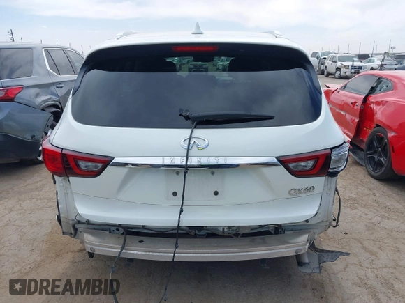 2019 Infiniti QX60 LUXE with VIN 5N1DL0MN5KC503552, listed as a IAAI auction lot 41780408 with 73,148 mi miles. Bid and sale history available at carsss.com. Image 17.