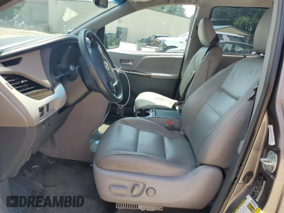 2015 Toyota Sienna XLE с VIN 5TDYK3DC7FS577620, выставлен на аукционе Copart как лот 65393635 с пробегом 179 998 миль миль и Чистый • Clean title. История ставок и продаж доступна на DreamBid. Изображение 7.