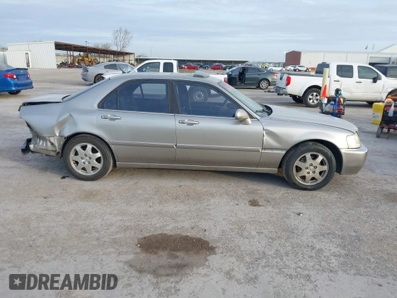 2002 Acura RL with VIN JH4KA96552C008589, listed as a IAAI auction lot 41860930 with 210,847 mi miles and . Bid and sale history available at DreamBid. Image 14.
