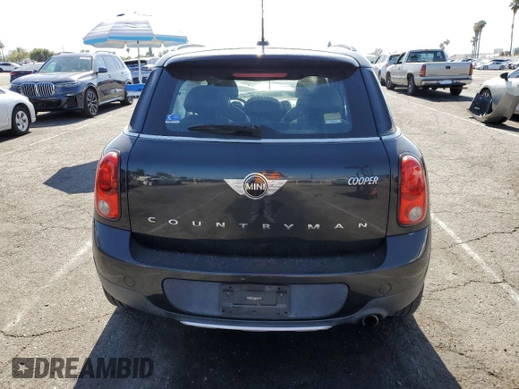 2016 MINI Countryman with VIN WMWZB3C58GWR47074, listed as a Copart auction lot 57174885 with 83,062 mi miles and Salvage title. Bid and sale history available at DreamBid. Image 6.